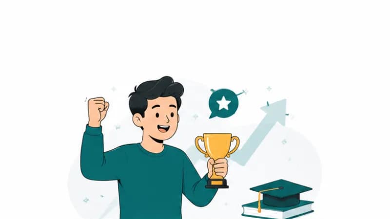 A student celebrating with a trophy beside a graduation cap